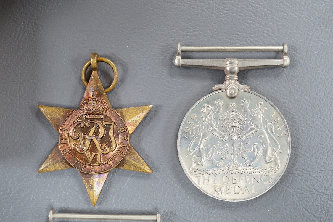 A WWII medal group awarded to E.A. Maidment, comprising; 1939-45 Star, Italy Star, Defence Medal and War Medal, in original card issue box with leaflet. Condition - good, medals still contained within their greaseproof e